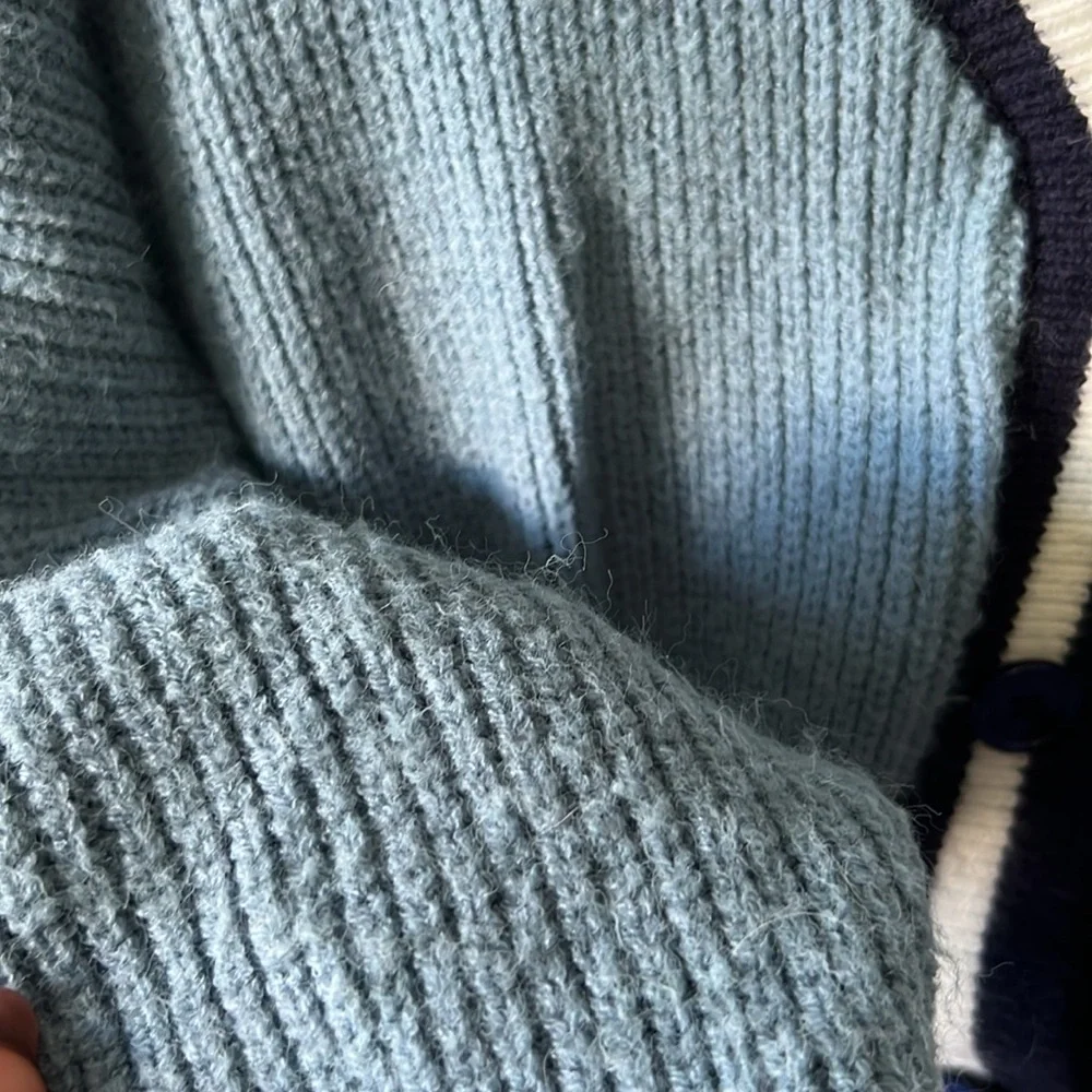 blue buttoned cardigan